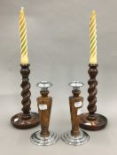 Two pairs of candlesticks,