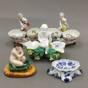 A pair of Berlin salts, a Meissen blue and white salt, etc.