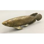 A brass model of a fish