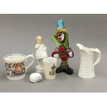 A Royal Worcester figure, a Murano glass clown, a Dame Laura Knight Coronation mug, etc.