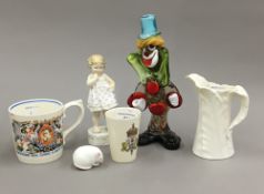 A Royal Worcester figure, a Murano glass clown, a Dame Laura Knight Coronation mug, etc.