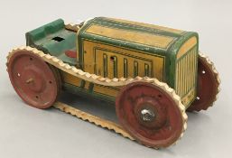 A vintage German tinplate tractor