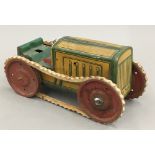 A vintage German tinplate tractor