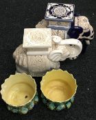 Two ceramic elephants and a pair of Majolica jardinieres