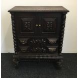 A 19th century carved side cupboard