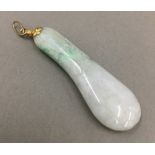 A Chinese carved jade pendant