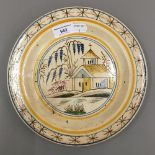 A Continental soft paste polychrome plate