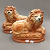 A pair of Staffordshire lions