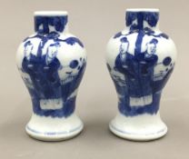 A pair of small 19th century Chinese blue and white vases