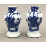 A pair of small 19th century Chinese blue and white vases