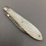 A mother-of-pearl fruit knife with silver blade