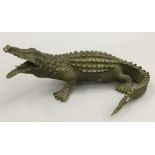 A bronze model of a crocodile