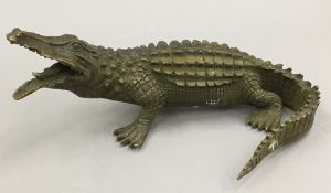 A bronze model of a crocodile