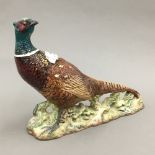 A Beswick pottery pheasant,