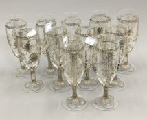 Eleven Murano glass flutes with Italian silver mounts