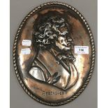 A silver plated plaque of Beethoven's profile portrait