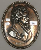 A silver plated plaque of Beethoven's profile portrait