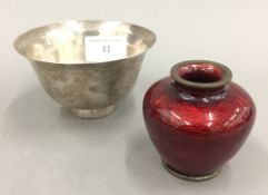 A small Meiji period cloisonne vase and an unmarked Japanese silver bowl with traces of gilding