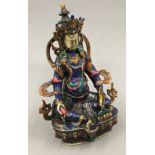 An enamel decorated deity