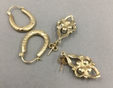 A pair of 9 ct gold pearl set drop earrings,