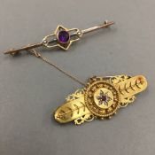 A 15 ct gold diamond and ruby set bar brooch,