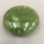 A Chinese spinach green jade circular box and cover