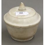 An alabaster pot and cover