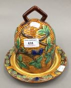 A Majolica style beehive form cheese dish