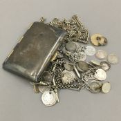 Silver coin set chains, a silver Masonic pendant, etc.