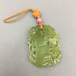 A Chinese carved jade pendant