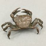 A small bronze model of a crab