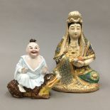 A 19th century Continental porcelain figural scent bottle and a Satsuma Guanyin