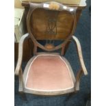 An Edwardian inlaid mahogany open armchair