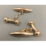 A pair of Edwardian rose gold torpedo and dumbbell cufflink's (4 grammes)