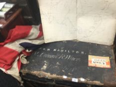 A Victorian Naval trunk, containing maps, photos, flag and desk cannon. The trunk inscribed R. Wace.