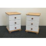 A pair of modern white painted bedside drawers and a modern white painted standing bookcase