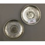 Two Chinese coin dishes