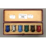 A cased set of Austrian miniature shot tumblers