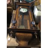 A 19th century walnut cased Vienna regulator wall clock,