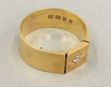 An 18 ct gold diamond set gentleman's ring,