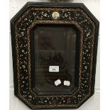 A 19th century Continental ebony and bone inlaid wall mirror.