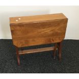 A Victorian walnut Sutherland table