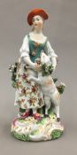 A 19th century porcelain figure,