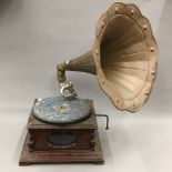 A vintage gramophone with brass horn
