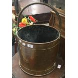 An early 20th century copper coal bucket