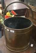 An early 20th century copper coal bucket