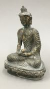 A bronze model of Buddha