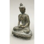 A bronze model of Buddha