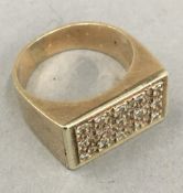 A gentleman's 9 ct gold diamond signet ring