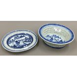 A 19th century Chinese blue and white reticulated bowl on stand